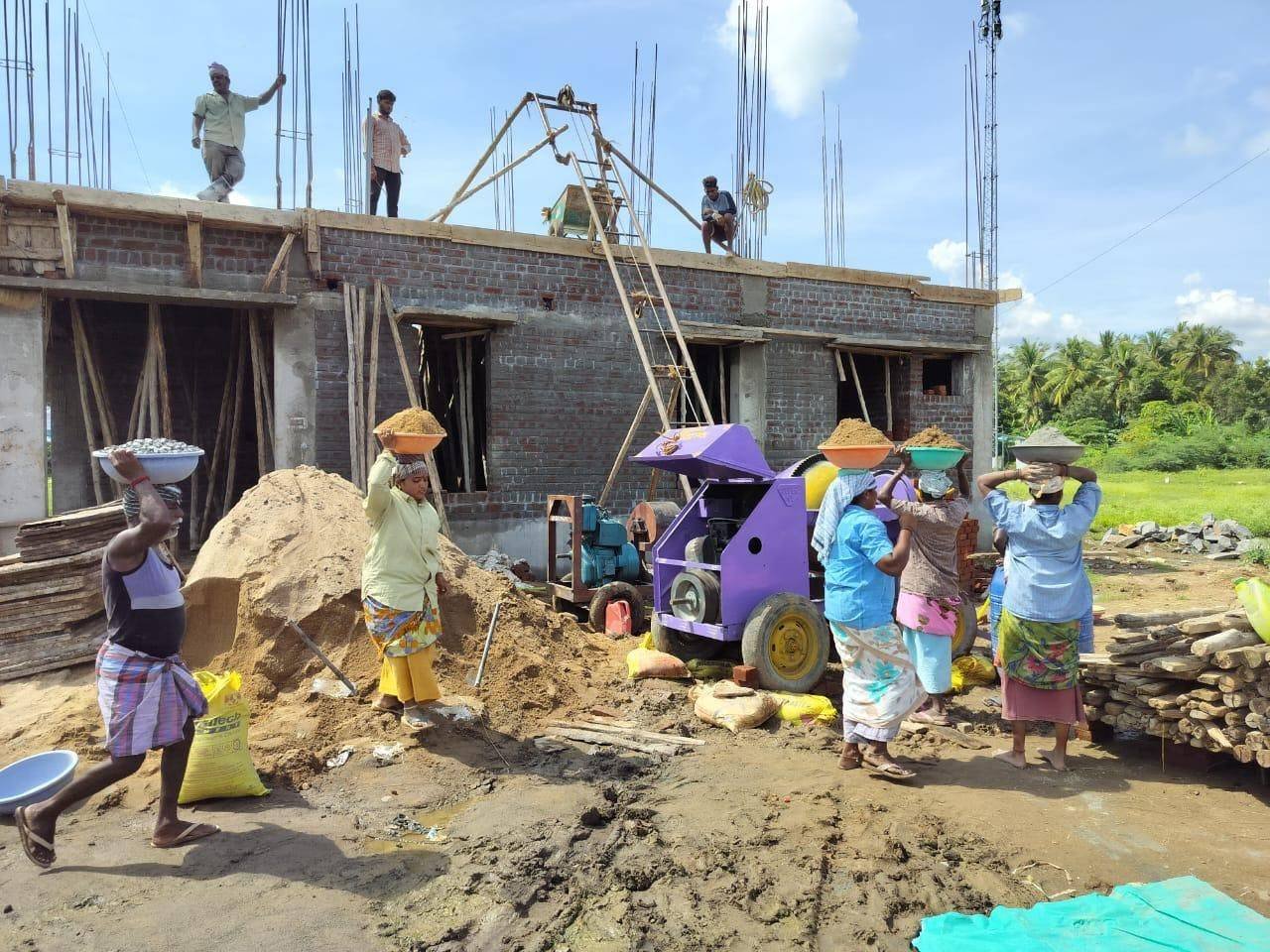 Worksite view with team building foundation and structure in Salem